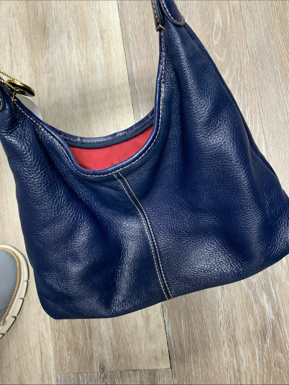 The Sak Navy Leather Shoulder Bag with Red Lining